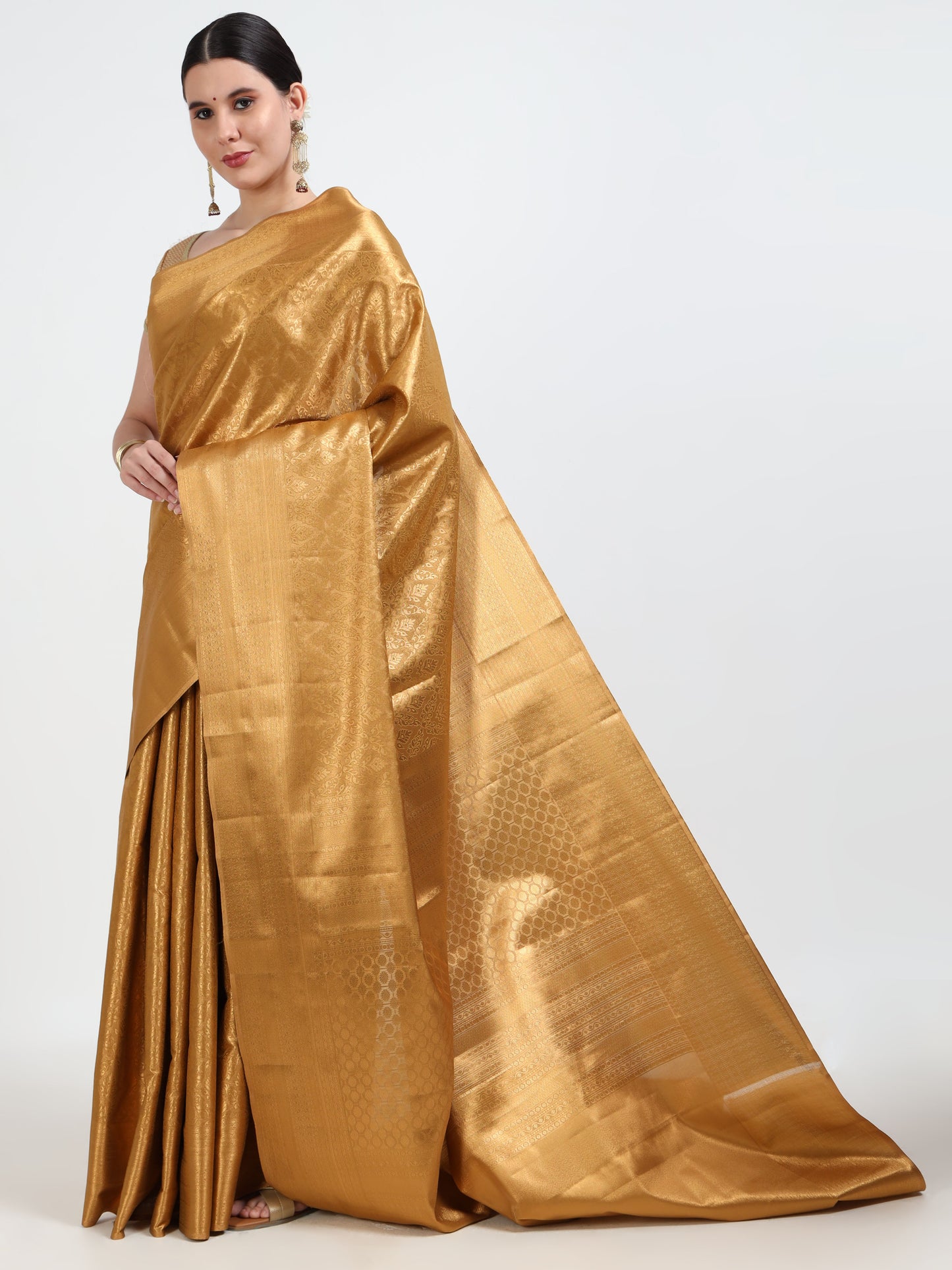 Golden silk saree with matching unstitched blouse