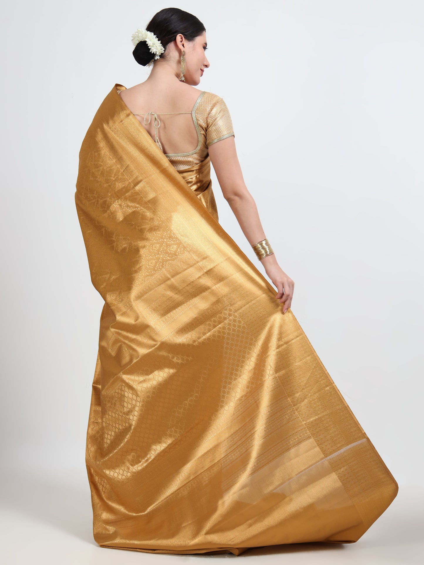 Golden silk saree with matching unstitched blouse